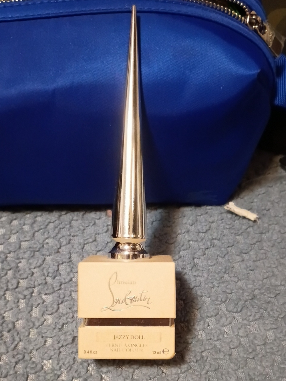 AChristian Louboutin Jazzy Doll Nail Polish with Silver Spike Cap - Cream